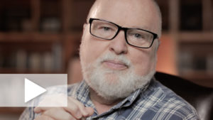 A video still of Richard Rohr explaining the Daily Meditations theme for 2018 with a play button overlay.