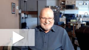 Richard Rohr smiling in his home