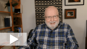 Video still of Richard Rohr speaking and smiling